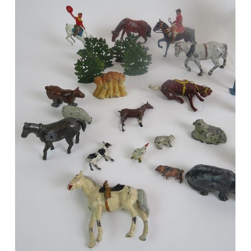 45 - A large quantity of Diecast animals and figures, C1950s, some marked 'Britains'.
(qty).
Condition re... 