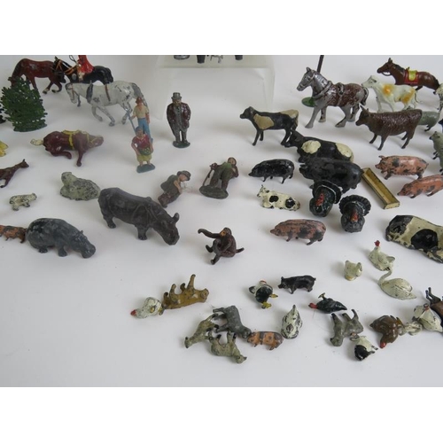 45 - A large quantity of Diecast animals and figures, C1950s, some marked 'Britains'.
(qty).
Condition re... 