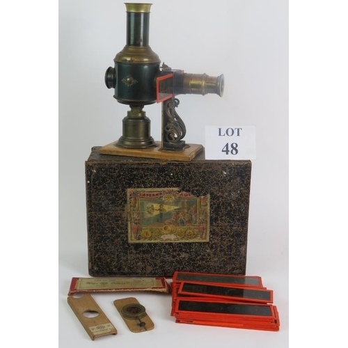 48 - An antique German Magic Lantern by Ernst Plank, in original box with a quantity of glass slides and ... 