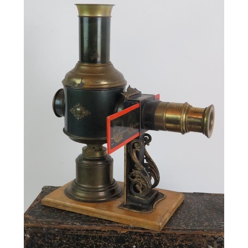 48 - An antique German Magic Lantern by Ernst Plank, in original box with a quantity of glass slides and ... 