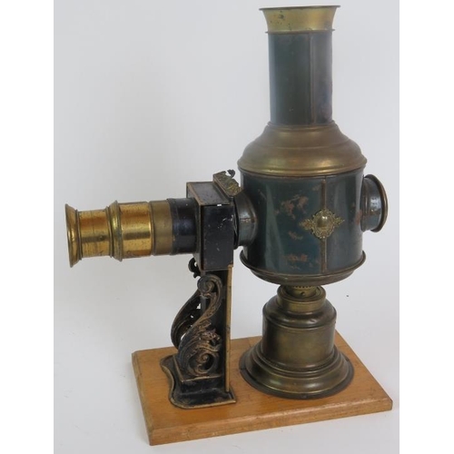 48 - An antique German Magic Lantern by Ernst Plank, in original box with a quantity of glass slides and ... 