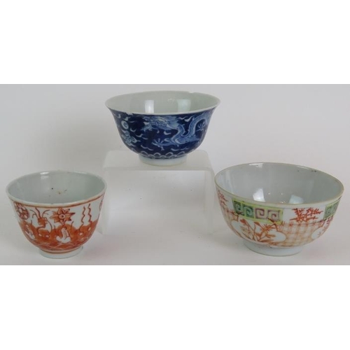 49 - Three antique Chinese porcelain bowls, one blue and white depicting a five claw dragon chasing a pea... 