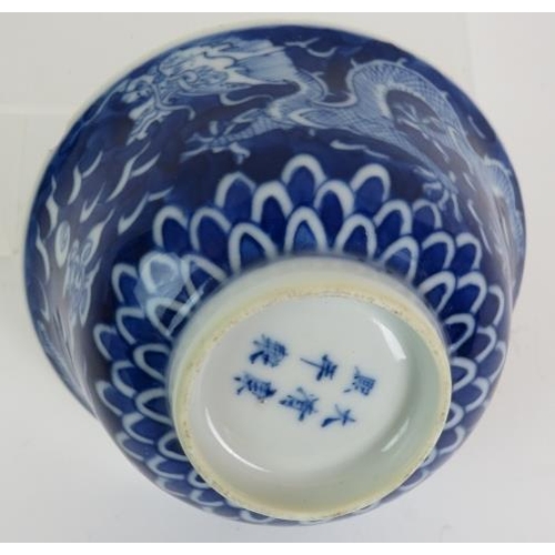 49 - Three antique Chinese porcelain bowls, one blue and white depicting a five claw dragon chasing a pea... 