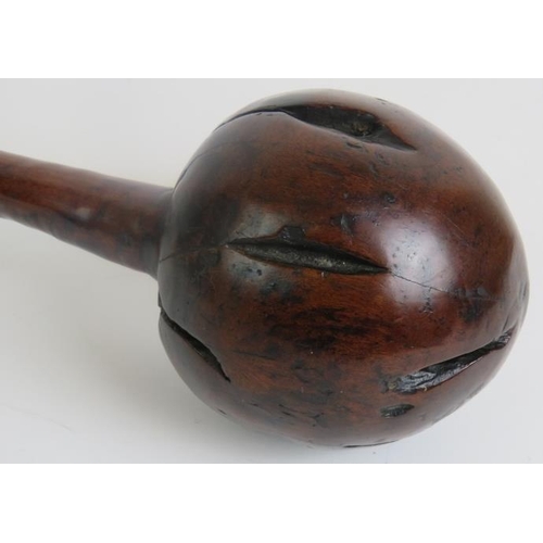 5 - A mid 19th Century I-ula Fijian throwing club with globe rootwood head, zig-zag carved handle and co... 