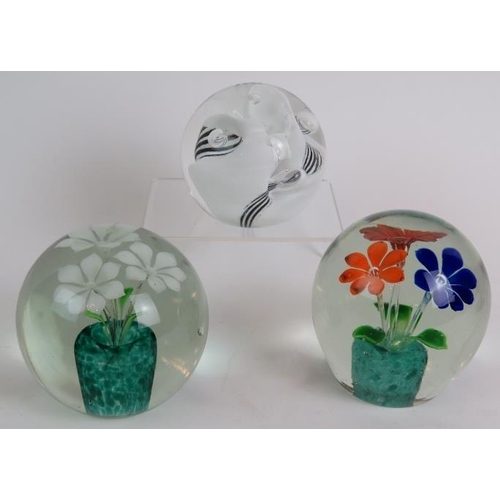 59 - Five glass paperweights to include a Perthshire Millefiori example, an irridescent Okra weight, sign... 