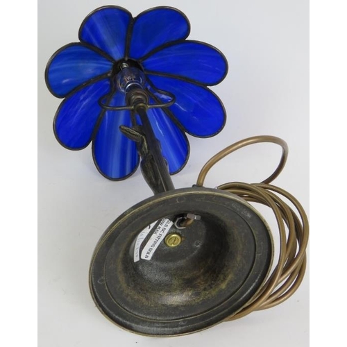 67 - A Tiffany style table lamp with bronze nude under a blue glass petal shaped shade. Overall height 47... 