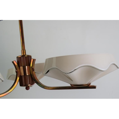 72 - A period Art Deco three branch ceiling light in polished copper with fluted pink tinged opaline shad... 