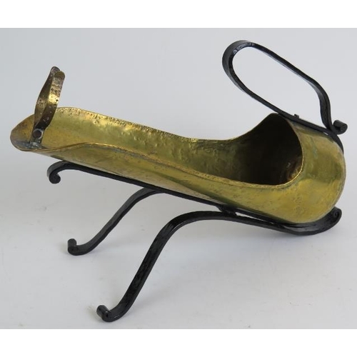 74 - A scratch made Arts and Crafts style wine bottle holder with brass body signed Goardere, circa 1950s... 