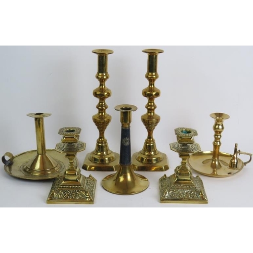 87 - A pair of antique brass aesthetic movement candlesticks, a pair of tall Georgian style candlesticks,... 