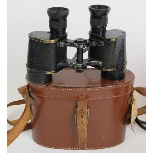 90 - Three pairs of binoculars, two cased plus part of a 1952 T29 tank periscope numbered TD18313. (4).
C... 