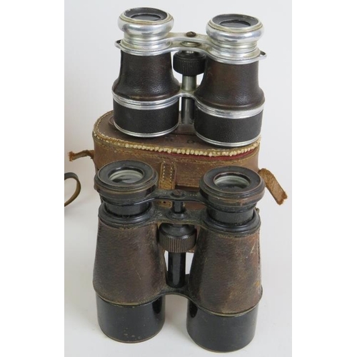 90 - Three pairs of binoculars, two cased plus part of a 1952 T29 tank periscope numbered TD18313. (4).
C... 