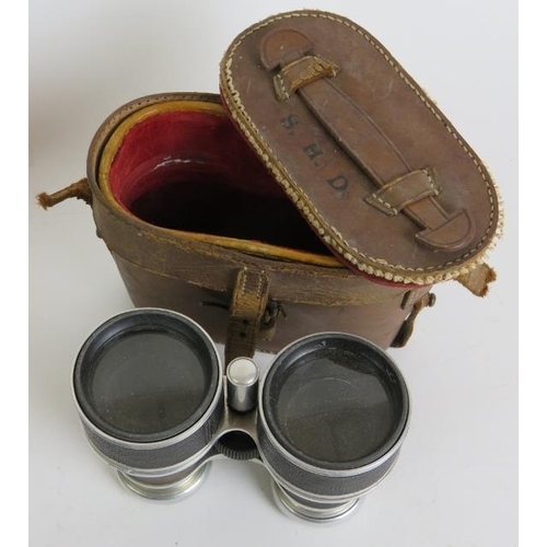 90 - Three pairs of binoculars, two cased plus part of a 1952 T29 tank periscope numbered TD18313. (4).
C... 