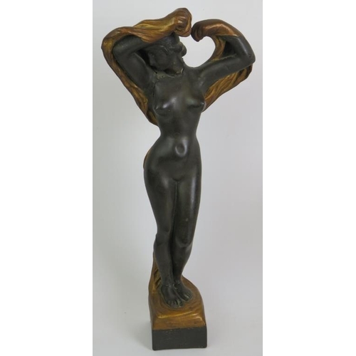 92 - A cast metal Art Deco figure of a dancer on an alabaster plinth, a well cast Spelter Marley Horse an... 