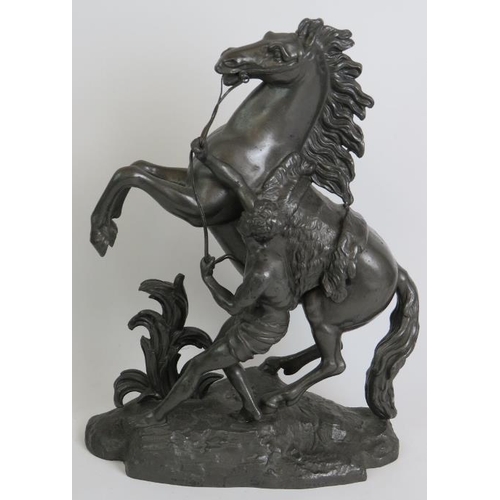 92 - A cast metal Art Deco figure of a dancer on an alabaster plinth, a well cast Spelter Marley Horse an... 