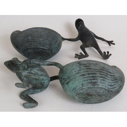 93 - A pair of cute bronze frog character planters or cache pots. Length 2 6cm. (2).
Condition report: No... 