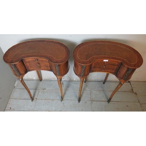 702 - A pair of vintage French kidney shaped burr walnut & tulipwood bedside tables with gilt metal mounts... 