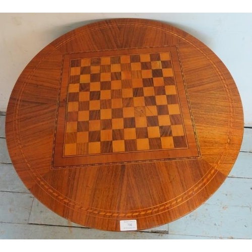 704 - A 19th century walnut parquetry inlaid circular games table, with chessboard inlay & single blind fr... 