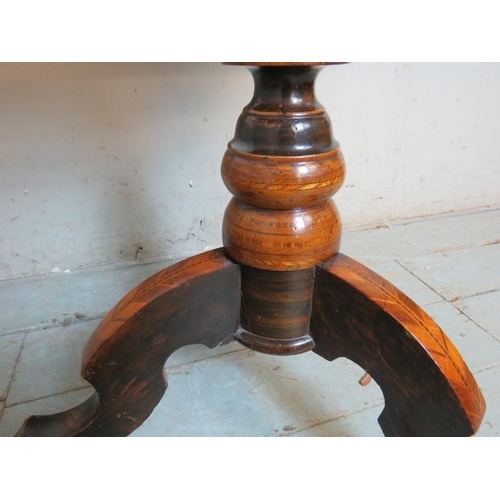 704 - A 19th century walnut parquetry inlaid circular games table, with chessboard inlay & single blind fr... 