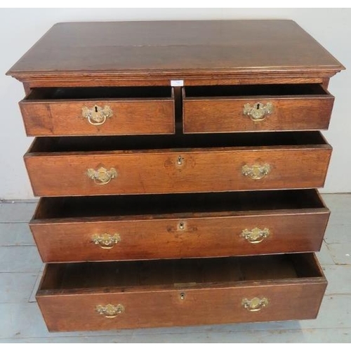 706 - A George III oak chest of drawers of excellent colour, comprising two short over three long graduate... 