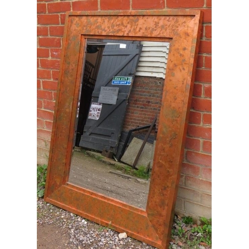 707 - A large contemporary bevelled rectangular wall mirror with copper surround.
Condition report: No iss... 