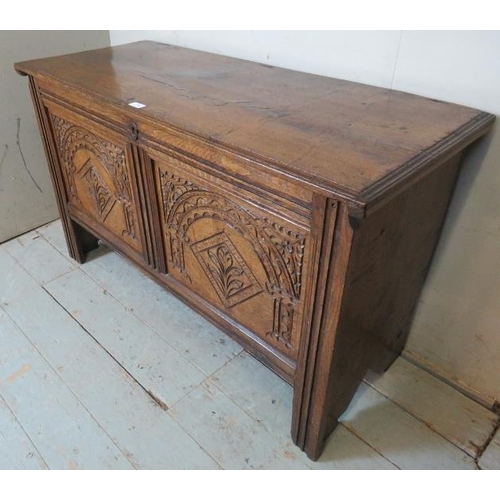 708 - An 18th century medium oak coffer of excellent colour with internal candlebox & carved decoration to... 