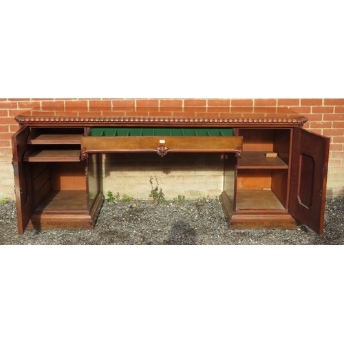 710 - A very large good quality Victorian figured mahogany sideboard featuring gadrooned edging & applied ... 