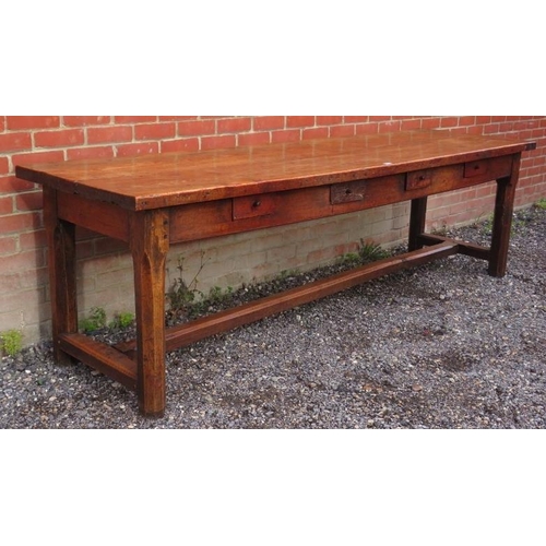 711 - A very large 18th/19th century country made fruitwood kitching/dining table with four frieze drawers... 