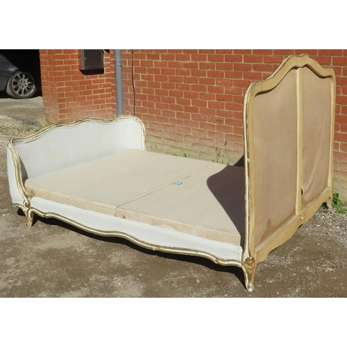 725 - A vintage French double bed, the giltwood frame carved with acanthus leaves & scrolls, raised on scr... 