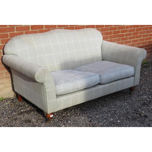 726 - A contemporary two seater sofa in the Laura Ashley style upholstered in grey check fabric, raised on... 