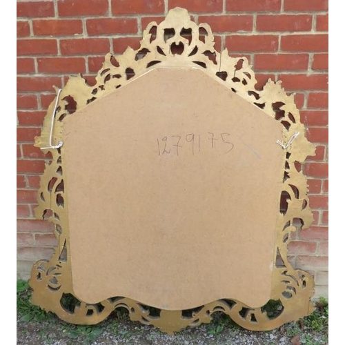 728 - A very ornate large mirror to match previous (lot 727). The carved & pierced giltwood surround adorn... 