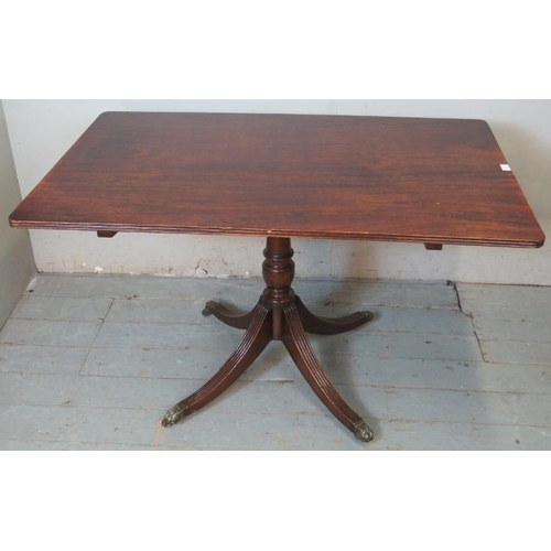 730 - An Edwardian Regency revival mahogany rectangular tilt top breakfast table with reeded edge , raised... 