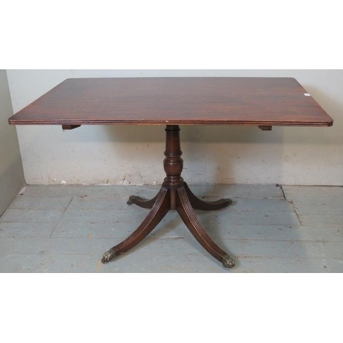 730 - An Edwardian Regency revival mahogany rectangular tilt top breakfast table with reeded edge , raised... 