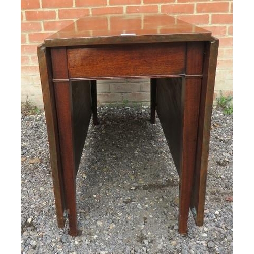 736 - A Georgian mahogany drop leaf dining table with two removable 'D end' sections, raised on tapering s... 