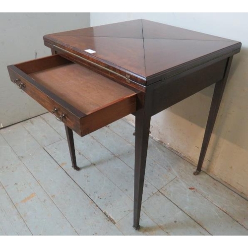 738 - An Edwardian Regency revival mahogany envelope card table with single frieze drawer fitted with bras... 