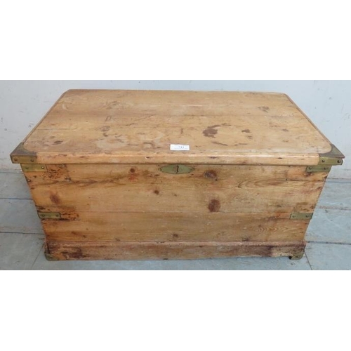 744 - A small antique pine flat top trunk/blanket box with brass mounts & handles to either side.
Conditio... 