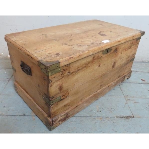 744 - A small antique pine flat top trunk/blanket box with brass mounts & handles to either side.
Conditio... 