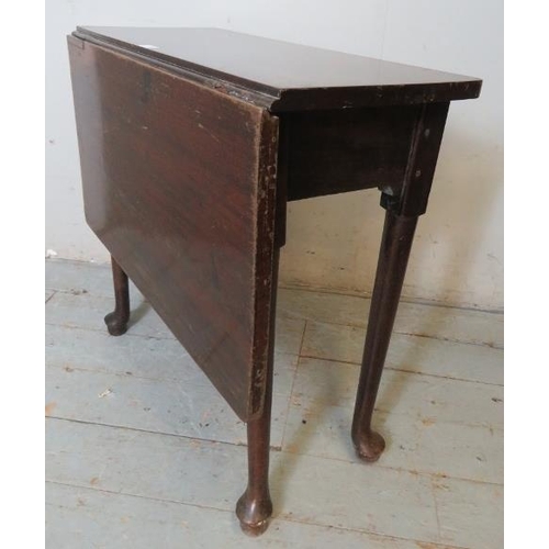 759 - A Georgian mahogany single drop leaf table with gateleg action, raised on tapering supports with pad... 