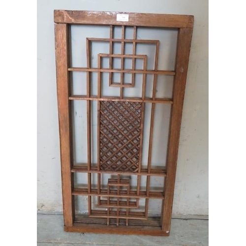 766 - A vintage Korean two section latticework folding screen.
87cm high x 92cm wide x 3cm deep (approx).