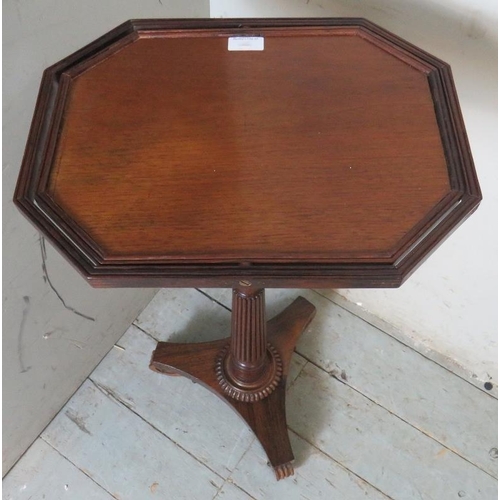 786 - An unusual Regency mahogany & rosewood height adjustable tea table, the octagonal top encircled by a... 