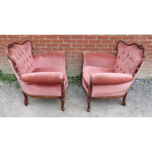 792 - A pair of reproduction French show-wood armchairs in the 19th century taste, upholstered in salmon b... 