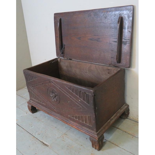 796 - A small antique oak metal bound coffer/blanket box with relief carving to lid depicting a ship at se... 