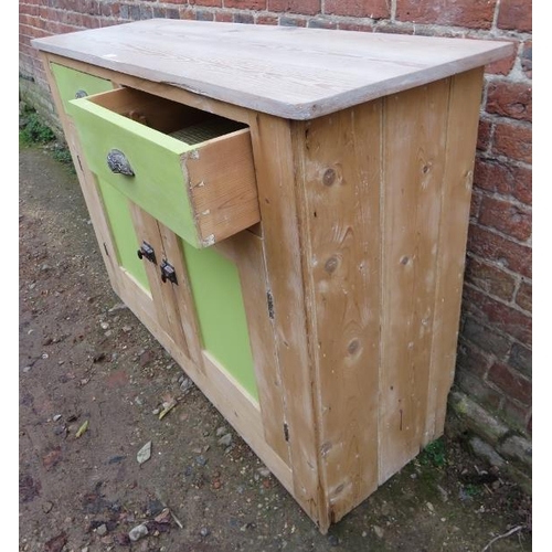 809 - A stripped antique pine sideboard containing two short drawers with fancy scallop handles over two c... 