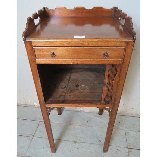 818 - A George III mahogany bedside cabinet with castellated 3/4 gallery, single cock beaded frieze drawer... 