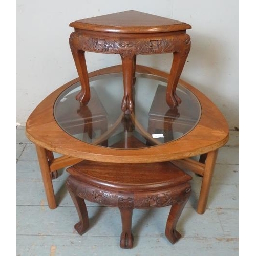 857 - Four vintage Chinese hardwood nesting tables with carved frieze depicting dragons & figural scenes, ... 