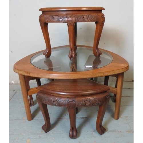 857 - Four vintage Chinese hardwood nesting tables with carved frieze depicting dragons & figural scenes, ... 