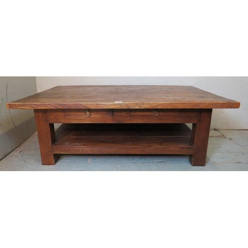 861 - A well built rustic solid hardwood low coffee table with two short frieze drawers, raised on square ... 