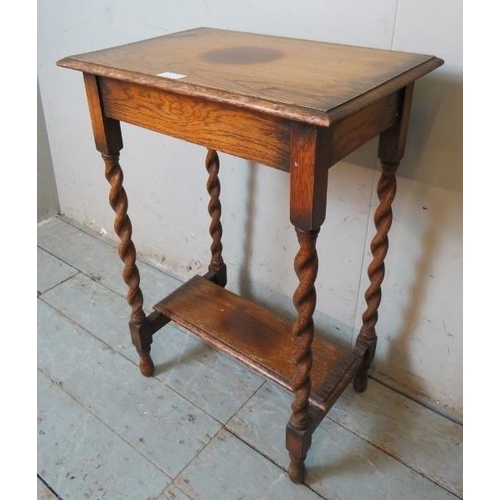 871 - A good quality reproduction solid oak period style two tier occasional table.
Condition report: Sun ... 