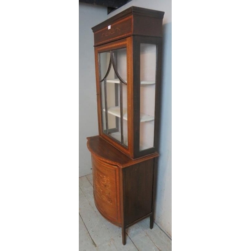 891 - An Edwardian Regency revival inlaid & crossbanded display cabinet with marquetry cornice over an ast... 