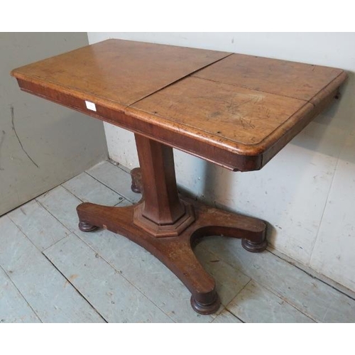 918 - A 19th century mahogany height adjustable lectern/side table with two folding bookrests to one side,... 