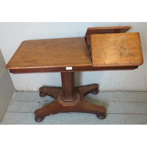 918 - A 19th century mahogany height adjustable lectern/side table with two folding bookrests to one side,... 